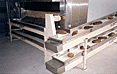 Belt conveyor for the baking-line process