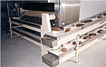 Belt conveyor for the baking-line process